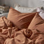 ÄNGSLILJA terracotta bedding folded detail