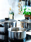 ANNONS stainless steel pots on stove