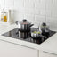 ANNONS pots with glass lids on induction hob