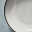 GLADELIG grey deep plate close-up glaze