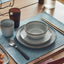 GLADELIG grey plate place setting