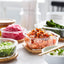 Clear IKEA 365+ containers with bamboo lids holding prepared food