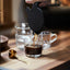 Coffee being poured into an IKEA 365+ glass mug
