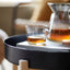 IKEA 365+ glass mug of tea on a tray