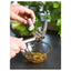 KONCIS garlic press in use