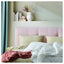 SMÅSPORRE light warm duvet, 200 × 200 cm, styled in a bedroom