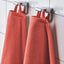 VÅGSJÖN orange-red bath towel detail
