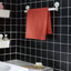 VÅGSJÖN orange-red bath towel in bathroom