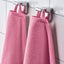 VÅGSJÖN pink towels hanging on hooks